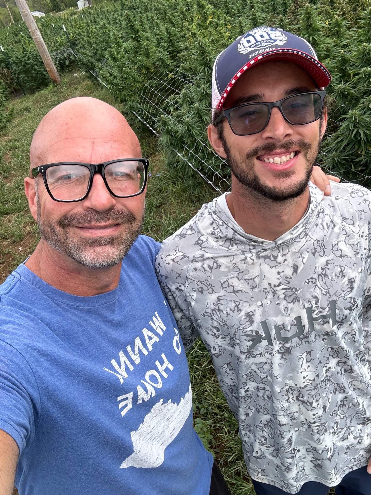 Sean & Zach standing in our CBD fields in KY ! 